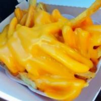 Cheesy Fries · Hand cut fries and melted cheddar.