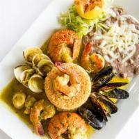 30. Mariscada de la Casa Veracruzana · Lobster tail, shrimp, scallops, clams and mussels in a green tomatillo and garlic broth. Ser...