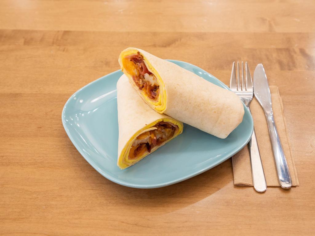 Breakfast Burrito · 2 scrambled eggs, ham, applewood smoked bacon, Vermont cheddar cheese and a hash brown on a plain wrap.