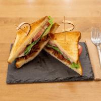Classic BLT Sandwich · Applewood smoked bacon, hearts of romaine lettuce, plum tomatoes and homemade herb mayonnais...