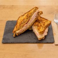 Scarsdale Sandwich · Melted Swiss cheese, sliced honey maple turkey and plum tomatoes with homemade honey mustard...