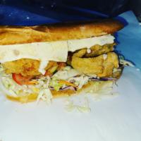 The Town Fish Sandwich  · Two Huge Pieces of Southern Fried Whiting Filets, Cabbage Slaw, Heirloom Tomatoes 🍅, Slice ...