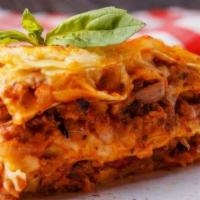 Lasagna · Pasta layered with ricotta, ground beef & Parmigiano Reggiano, topped with sauce & mozzarella.