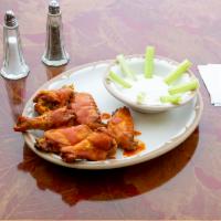 Chicken Wings · Served with blue cheese and celery and choice of Buffalo, BBQ, Sweet Teriyaki and Garlic Par...
