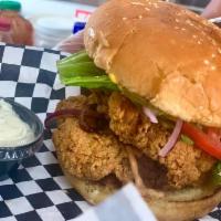 Boil Bar Fish Burger Basket · Cajun fried catfish with tarter sauce, onions, lettuce, tomatoes, pickles, mustard or mayo w...