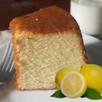 Sliced Lemon Pound Cake · Moist and dense lemon bundt cake slice