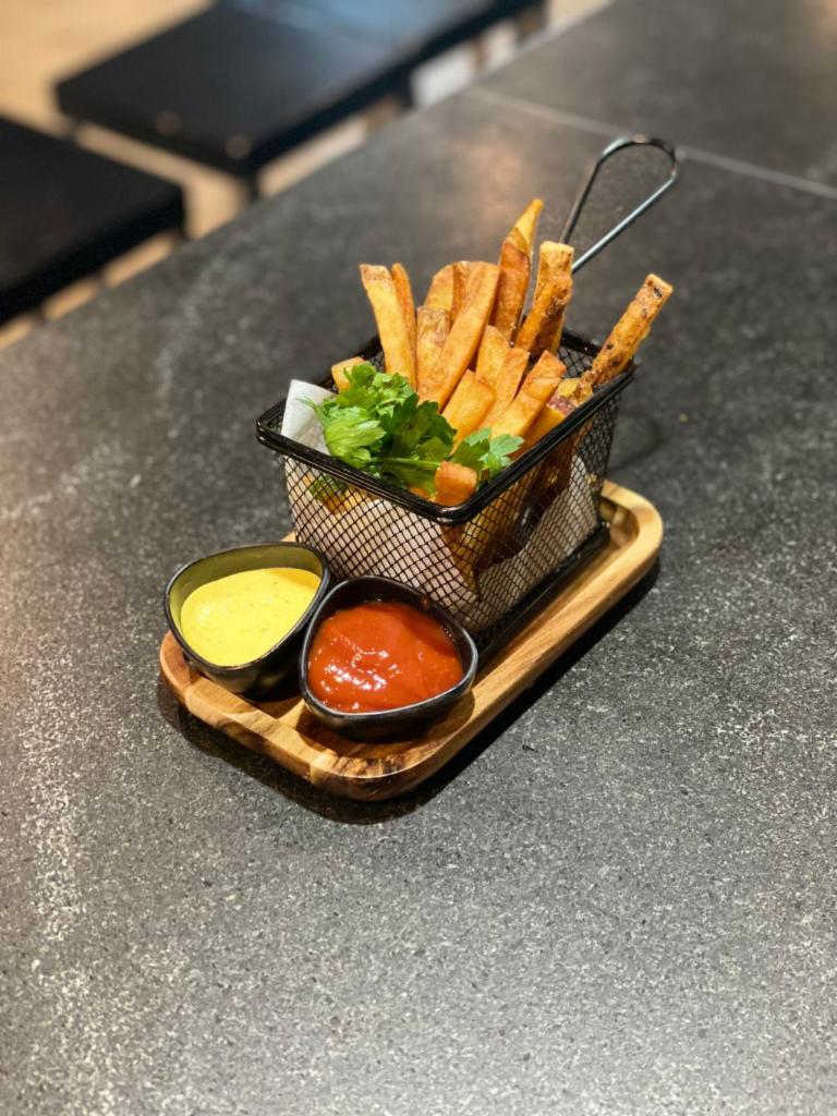 Hand Cut Fries  · served with wood vinegar aioli and spicy ketchup