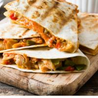 Quesadilla with Grilled Chicken · tortilla filled with grilled chicken, melted pepper jack cheese, grilled onions & peppers wi...