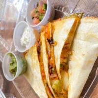 Quesadilla with kimchi · tortilla filled with shredded kimchi, melted pepper jack cheese, grilled onions & peppers wi...