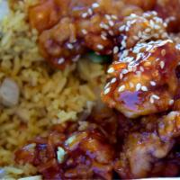 Sesame Chicken Bokkum Bap · Korean stir-fry rice with diced onions, carrots and scallion with oyster sauce or soy sauce,...