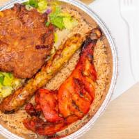 5. Combo Grilled Meat Platter · Over rice and salad with white or hot sauce. 1 tandoori chicken leg and thigh, 1  long chick...