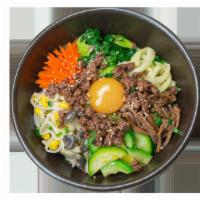 Bulgoki Bibimbap · Served with marinated thin sliced beef, fried egg on top, bowl of rice on the side. (Please ...