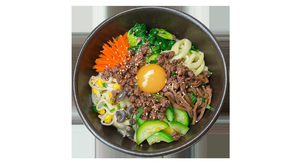 Bulgoki Bibimbap · Served with marinated thin sliced beef, fried egg on top, bowl of rice on the side. (Please note that vegetables are served cold)