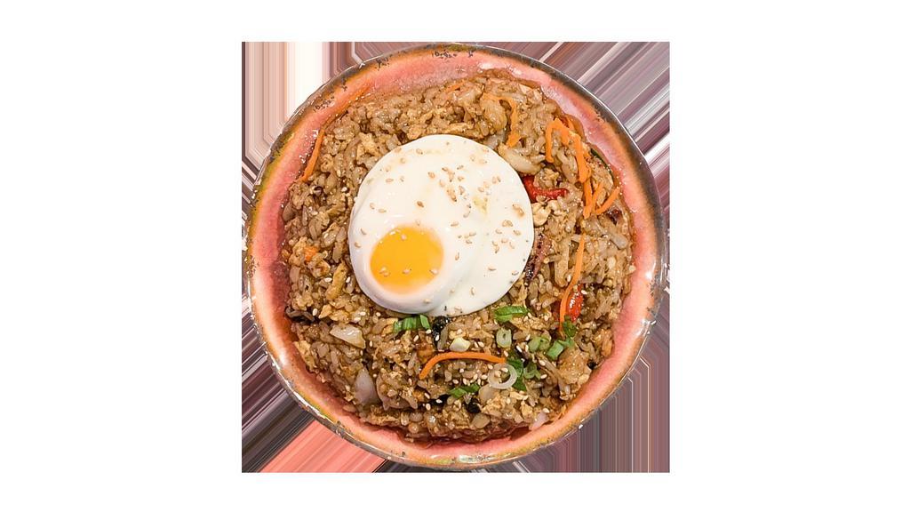 Teriyaki Fried Rice · Teriyaki fried rice with scrambled egg and fried egg on top.
 with choice of your topping.