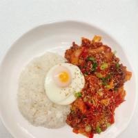 Spicy Pork & Bulgoki Over Rice · Pork and marinated beef stir fry over rice with fried egg on top.
spiciness level is adjusta...