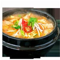 Soybean Paste Stew (deon jang chigae) · Bean paste stew with tofu, beef, potatoes, squash and peppers.