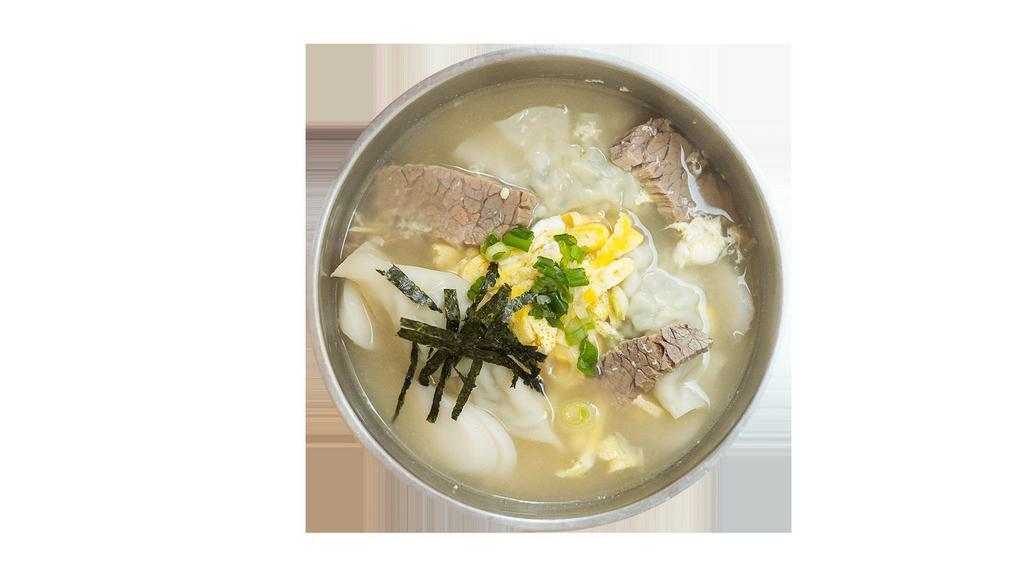 Rice Cake Soup · Slices of thin rice cake, beef dumpling, beef briskets, and egg, glass noodles.