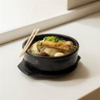 Samgye Tang (chicken soup) · Whole young chicken with sweet rice inside, dates, jujube and garlic.