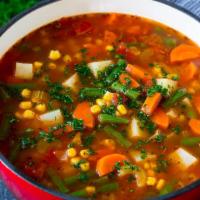 Garden Vegetable Soup · This vegetable soup is a hearty blend of colorful veggies and potatoes, all simmered togethe...