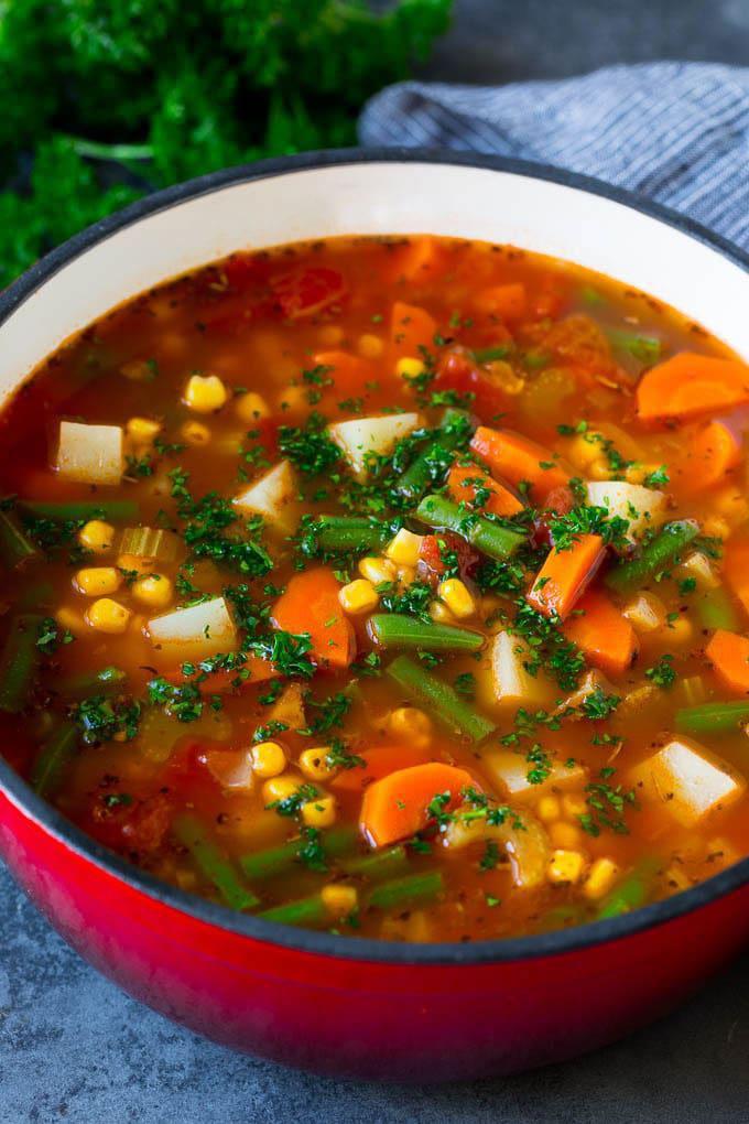 Garden Vegetable Soup · This vegetable soup is a hearty blend of colorful veggies and potatoes, all simmered together in a savory tomato broth. A healthy and flavorful dinner option that’s quick to make and always gets rave reviews!