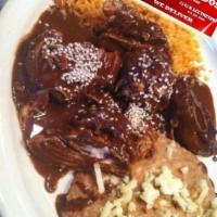 Mole Plate · Served with rice and beans.