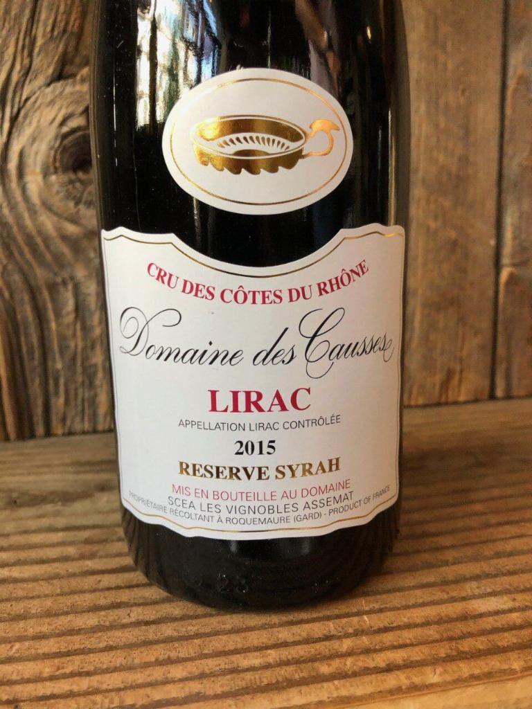 Lirac Domaine des Causses Rhone ·  Must be 21 to purchase. France. 750 ml. red wine, 14% ABV. 100% syrah. Nice deep red color. Round and harmonious, rich bouquet of black fruits and spices. Generous and well-balanced, with soft tannins and a long finish, it mellows with age to become full and meaty. Enjoy it with grilled red meats, poultry, small game, and hard or semi-hard cheese as well as black chocolate sweets. 
