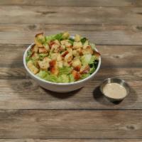 Caesar Salad · Romaine lettuce, croutons, grade cheese and Caesar dressing.