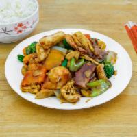 2. Happy Family · Scallop, jumbo shrimp, white meat chicken, beef, roast pork, sauteed with mixed vegetables i...