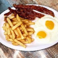 #8. Huevos al Gusto con Papa Frita y Bacon · Eggs any style, served with french fries and bacon.