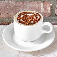 Mochaccino · Our homemade chocolate syrup, espresso, and steamed milk.