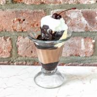 Ice Cream Sundae · Two scoops of our homemade ice cream,  your choice of 2 toppings. Fresh whipped cream, and a...
