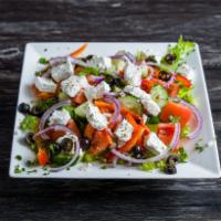 Greek Salad · Lettuce, tomatoes, cucumber, onions, black olives & greek feta cheese. Served with balsamic ...