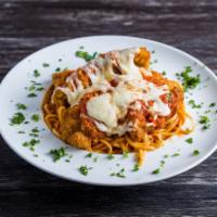 Chicken Parmigiana · Chicken breast with pasta of your choice in homemade tomato sauce baked with mozzarella chee...