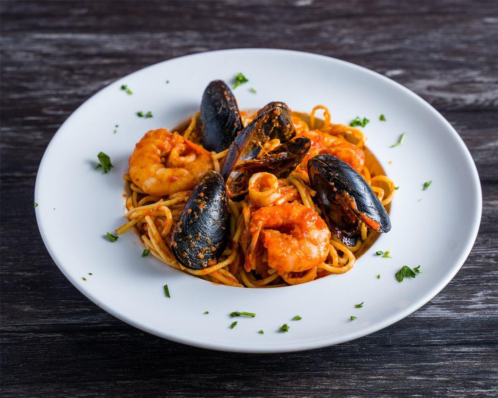 Seafood Pasta · Mix of Shrimps, Mussels and Calamari all tossed together with pasta in a homemade Marinara sauce.