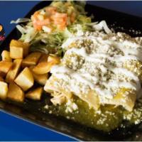 Enchiladas Calvillo · Red or green sauce, chicken or cheese. Served with your choice, rice and beans, or potatoes ...