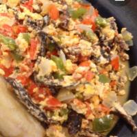 Herring with Eggs Breakfast Special · Cut all the vegetables peppers onions, make a sofrito with the Herring on it and shake coupl...