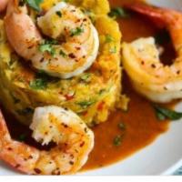 Mofongo de Camarones · Shrimp. Mofongo 
Mash green Platano with garlic and butter on 
Souse after and piece of shri...
