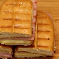 Jamon y Queso Sandwich · Ham and cheese. Melted cheese with delicious Hans with butter on it. perfectly on it crunchy...