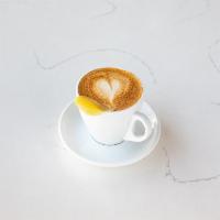 L'Orange Cappuccino · Orange zest, cinnamon, house-made caramelized vanilla, espresso, whole milk