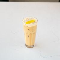 Lemon Meringue Cold Brew · Muddled lemon zest, house-made vanilla bean syrup, nitro cold brew, cream