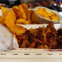Pulled Pork Platter · Pork smoked for countless hours, coated in our homemade swine sauce. Includes cornbread and ...