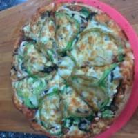 Vegetarian Pizza · Fresh spinach, broccoli, cauliflower, black olives, mushrooms, onions, green peppers and shr...