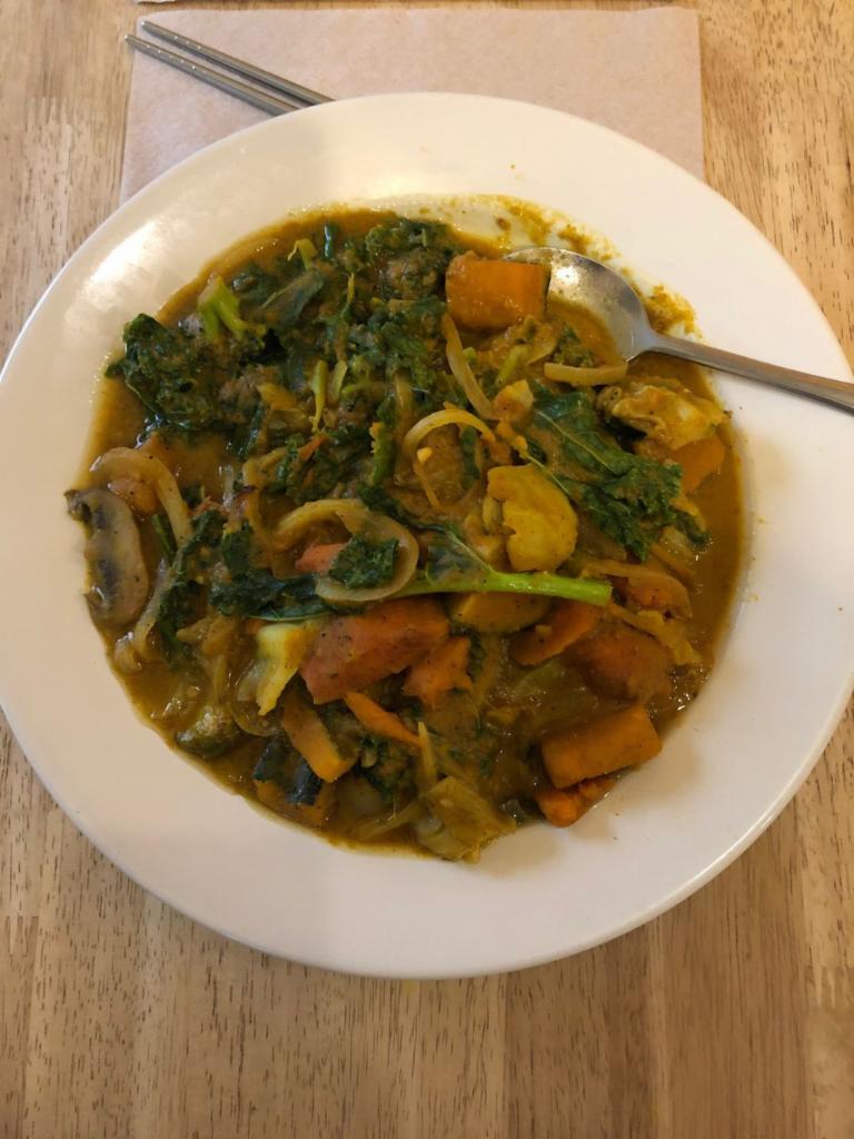 Veggie Curry Plate · Sauteed squash, onion, carrot, cabbage, broccoli and kale in mushroom curry sauce. Soy free. Nut free. Gluten free. Served with brown rice.