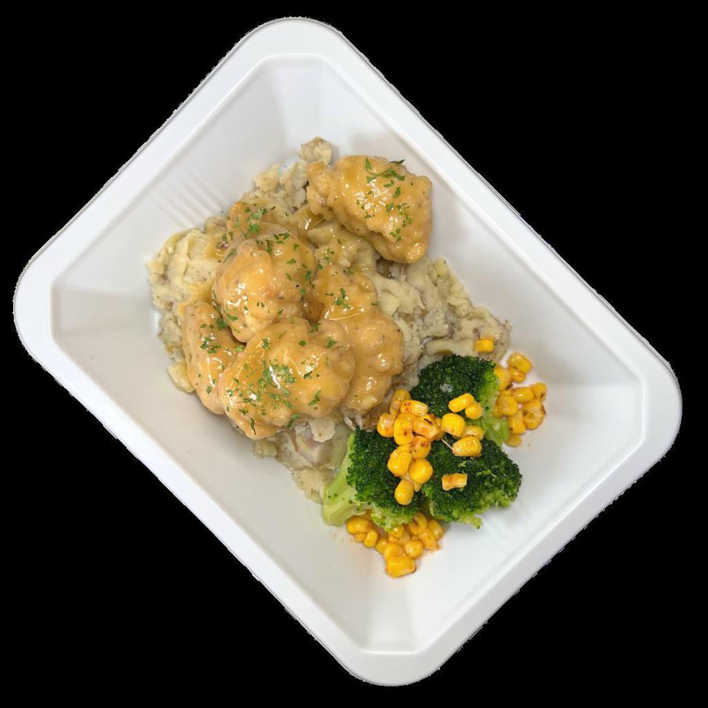 Southern Crispy Chicken  · Crispy southern style chicken with garlic mashed potatoes and a cajun spiced blend of corn and broccoli