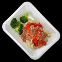 Steak and Potatoes · Fire-grilled steak topped with roasted red peppers and bacon served with broccoli and garlic...