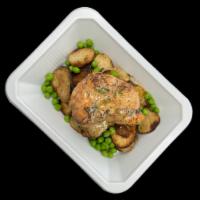 Honey Dijon Chicken · Tender chicken thigh topped with honey mustard over garlic roasted potatoes and sweet green ...