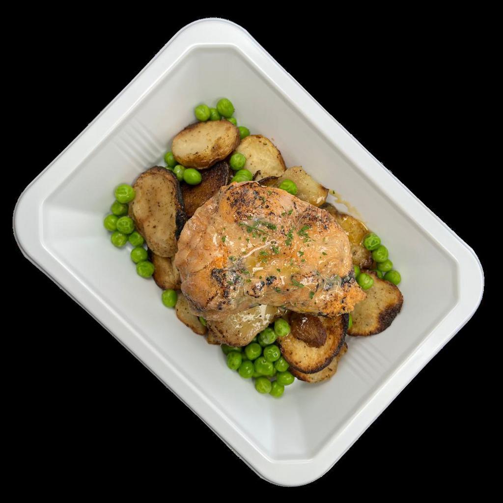 Honey Dijon Chicken · Tender chicken thigh topped with honey mustard over garlic roasted potatoes and sweet green peas.