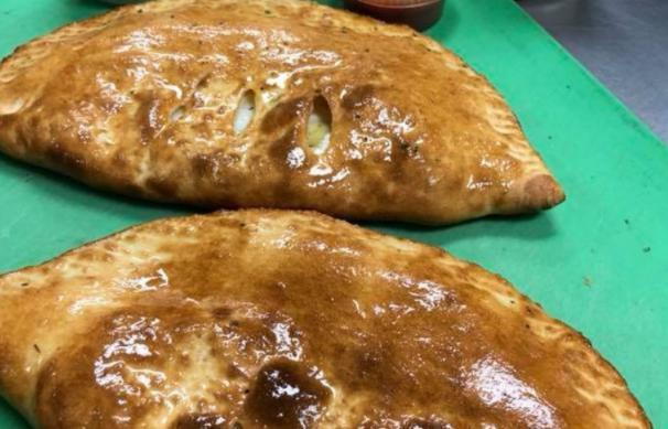 Three Cheese Calzone · Served with ricotta and mozzarella.