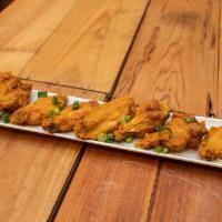 Island Wings · Our fresh wings are seasoned, deep fried & hand tossed in our authentic sauces – choice of: ...