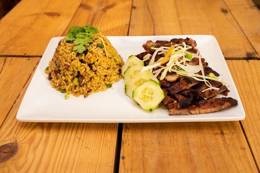 Jerk Pork · Jamaican style roast pork, pan tossed with our blend of Jamaican spices.